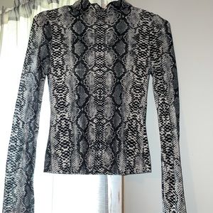 Turtle neck shirts both size small